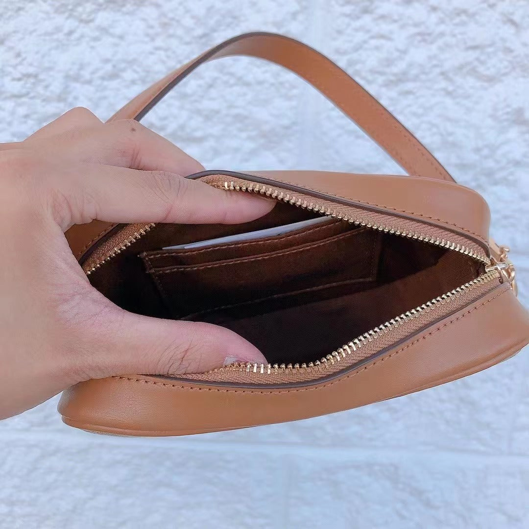 Coach CA718 Jamie Wristlet In Signature Canvas In Gold/Lt Khaki/Lt Saddle Coach CA718 Jamie Wristlet In Signature Canvas In Gold/Lt Khaki/Lt Saddle